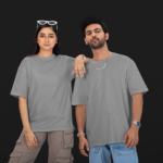 Couple wearing solid blank oversized T-shirt in Cool Grey
