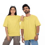 Couple wearing solid blank oversized T-shirt in Taupe